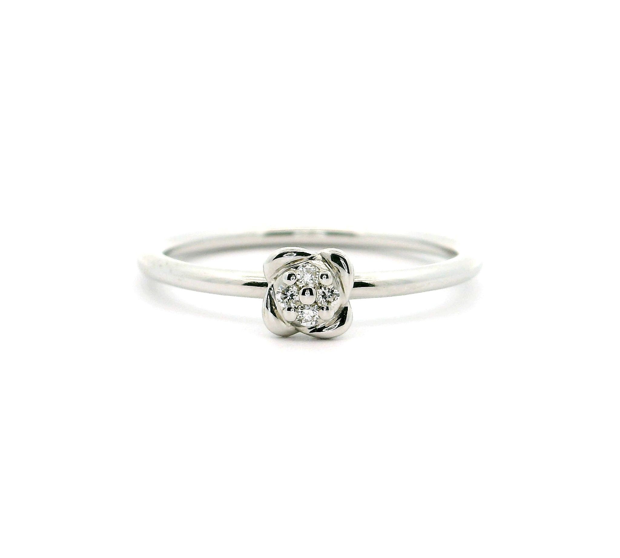 ring-blume-weissgold-4-diamanten-ecl1aa71w-frontansicht.jpg