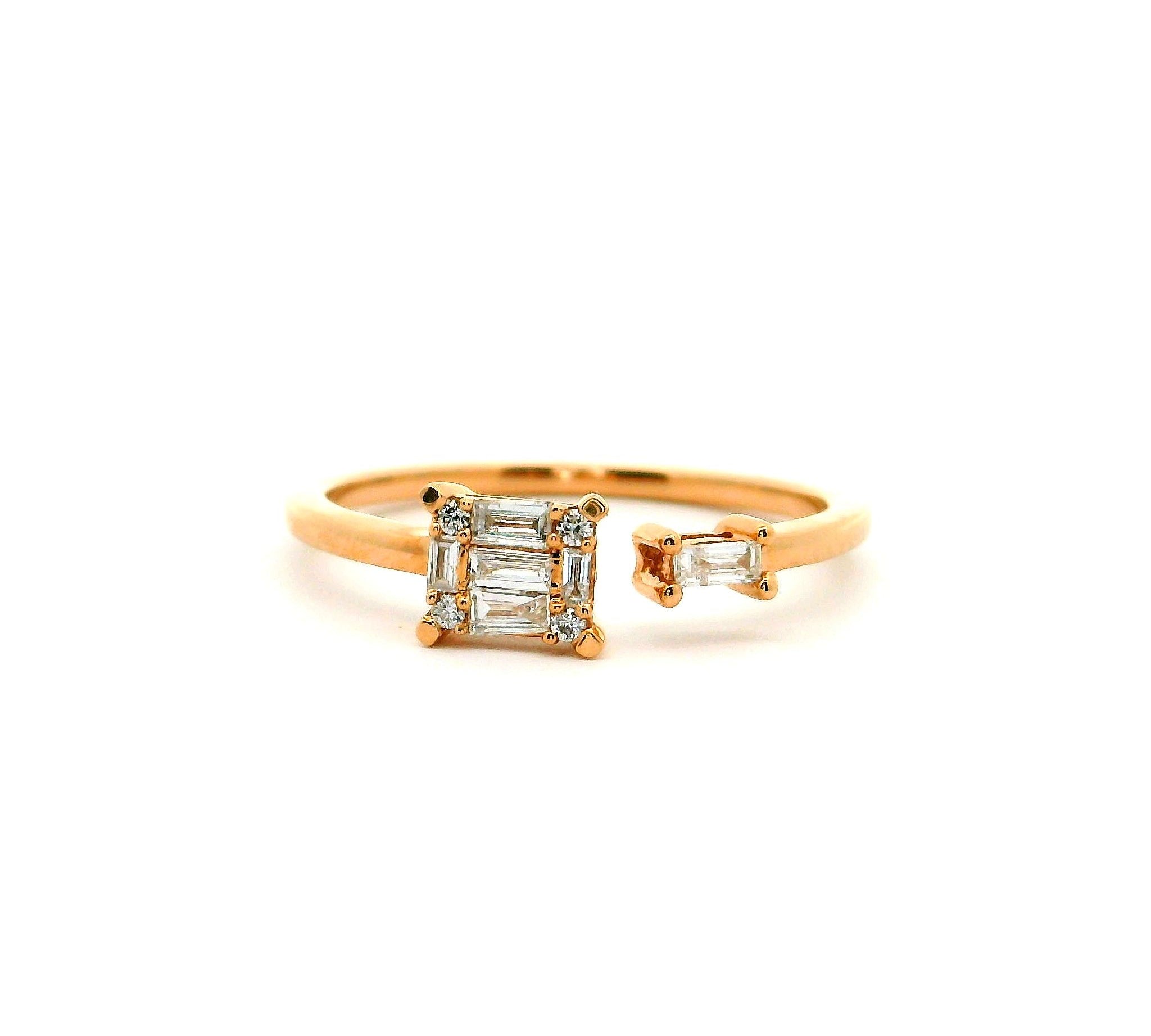 ring-rosegold-10-baguette-diamanten-ecl1cp24r-frontansicht.jpg